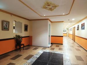 Fotografie z fotogalerie ubytování Capital O 90897 Island City Hotel v destinaci George Town