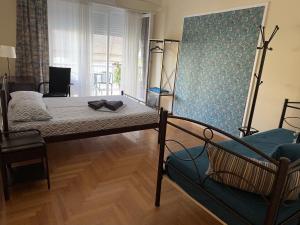Postel nebo postele na pokoji v ubytování Petaluda House 5