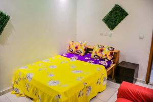 Giường trong phòng chung tại Residence VIP