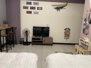 Letto o letti in una camera di 洄游民宿 Migration B&B
