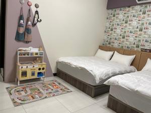 Letto o letti in una camera di 洄游民宿 Migration B&B