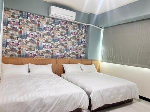 Letto o letti in una camera di 洄游民宿 Migration B&B