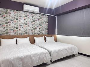 Letto o letti in una camera di 洄游民宿 Migration B&B