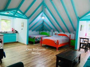 Postel nebo postele na pokoji v ubytování O'Soleil Chalets Self Catering