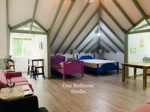 Postel nebo postele na pokoji v ubytování O'Soleil Chalets Self Catering