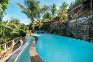 an image of a swimming pool at a resort at Parvati Retreat Villas in Ubud