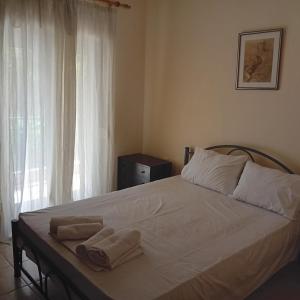 Postel nebo postele na pokoji v ubytování Stef Lux Home of Kriopigi