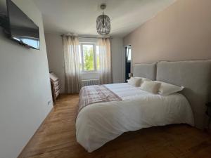Postel nebo postele na pokoji v ubytování L Hirondelle 1