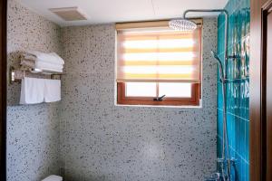 Ένα μπάνιο στο Rova Hotel - Positano Horse Phú Quốc