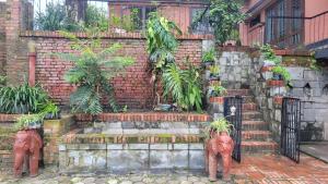 Ein Garten an der Unterkunft Karunamaya Hotel