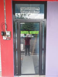 Muka bangunan atau pintu masuk Nafeeza Roomstay