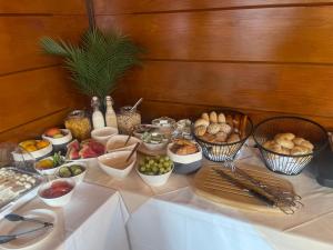 a table topped with lots of different types of food at Pension Jahn in Salzburg