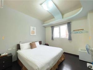 Postel nebo postele na pokoji v ubytování Miyue B&B