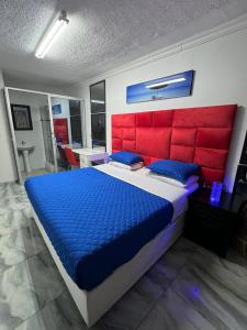 Postel nebo postele na pokoji v ubytování Evolution Guest House