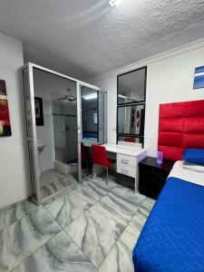 Postel nebo postele na pokoji v ubytování Evolution Guest House