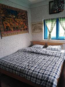 Postel nebo postele na pokoji v ubytování Etno kuća Krvavac