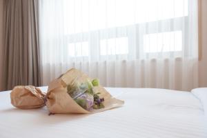Łóżko lub łóżka w pokoju w obiekcie Acube Hotel Dongdaemun