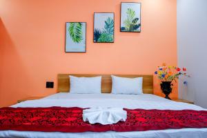 Ένα ή περισσότερα κρεβάτια σε δωμάτιο στο Rova Hotel - Positano Horse Phú Quốc +6 φωτογραφίες