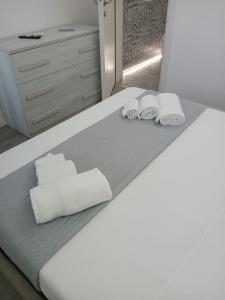 Postel nebo postele na pokoji v ubytování Residenza Aura