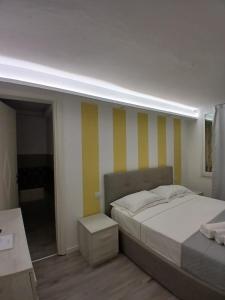 Postel nebo postele na pokoji v ubytování Residenza Aura + 4 fotografie