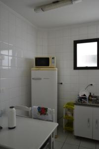 Dapur atau dapur kecil di Apartamento Satel Praia