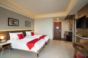 Postelja oz. postelje v sobi nastanitve Ramada by Wyndham Serpong