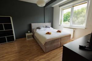 Posteľ alebo postele v izbe v ubytovaní Moderný apartmán s vlastným parkovaním v blízkosti prírody TOP