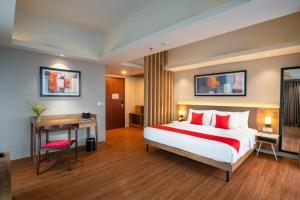 Postelja oz. postelje v sobi nastanitve Ramada by Wyndham Serpong