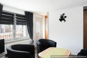 Posezení v ubytování Ferienwohnung in Bodden & Ostsee nähe