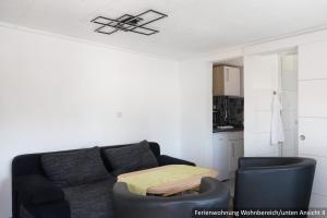 Posezení v ubytování Ferienwohnung in Bodden & Ostsee nähe