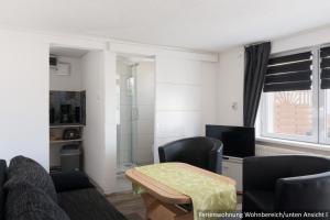 Posezení v ubytování Ferienwohnung in Bodden & Ostsee nähe
