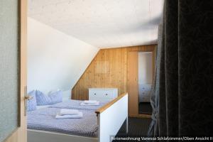 Postel nebo postele na pokoji v ubytování Ferienwohnung in Bodden & Ostsee nähe