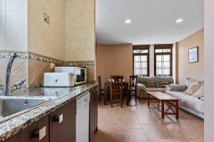 Η κουζίνα ή μικρή κουζίνα στο Apartamentos Turisticos As Cetareas