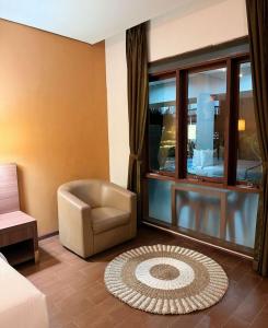 Χώρος καθιστικού στο Hotel Ompu Herti