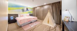 Letto o letti in una camera di Ascott Huai Hai Road Shanghai, Xintiandi