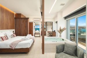 Postel nebo postele na pokoji v ubytování Elia Sea Suites + 37 fotografií