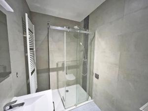 Ένα μπάνιο στο Astrid Sauna Appartement Antwerp