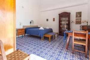 Postel nebo postele na pokoji v ubytování B&b 1787 in Montechiaro