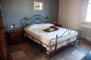 Una cama o camas en una habitación de Gemma B&B