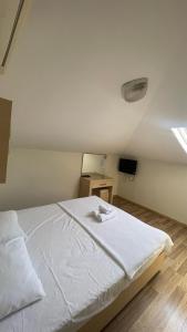 Postel nebo postele na pokoji v ubytování Agartha Suite Hotel Kemer
