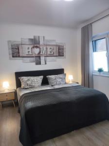 Ένα ή περισσότερα κρεβάτια σε δωμάτιο στο Ferienhaus Luna