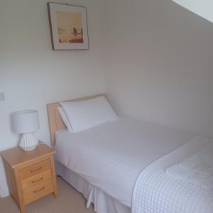Letto o letti in una camera di Home with a View