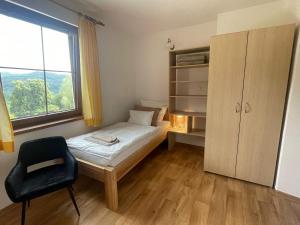 Postel nebo postele na pokoji v ubytování Chata Bedřiška