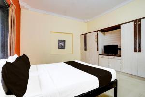 TV a/nebo společenská místnost v ubytování Hotel O Varun Residency