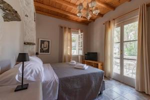 Posteľ alebo postele v izbe v ubytovaní Rania Apartments Sea View + 37 fotografií