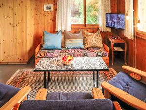 Un lugar para sentarse en Chalet Mungg by Interhome 32 fotos más