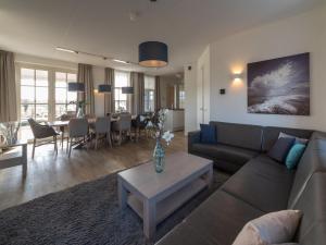 Posezení v ubytování Holiday Home Ganuenta-1 by Interhome + 20 fotografií