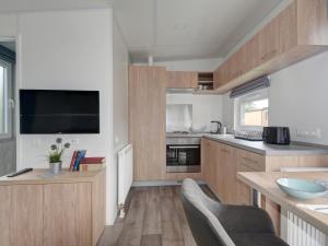 Η κουζίνα ή μικρή κουζίνα στο Holiday Home Tiny Haus Scharl by Interhome