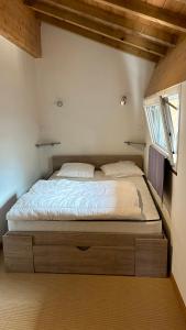 Voodi või voodid majutusasutuse Gîte En Damé with private pool toas