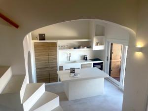 Gallery image of Strepitoso 4 Camere da letto e Terrazza Vista Mare in Capo Coda Cavallo